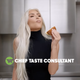 Kim Kardashian closing her eyes, savoring a burger she clearly hasn't taken a bite out of